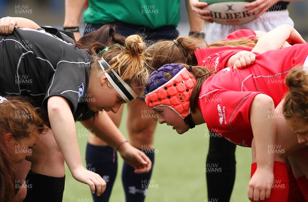 300417 - Under 18s Girls Rugby - East Wales v West Wales - Georgina Marsh of East Wales and Hatty Davies of West Wales prepare to scrummage