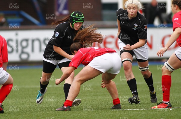 300417 - Under 18s Girls Rugby - East Wales v West Wales - Emma Preece of East Wales takes on Kayleigh Powell of West Wales 