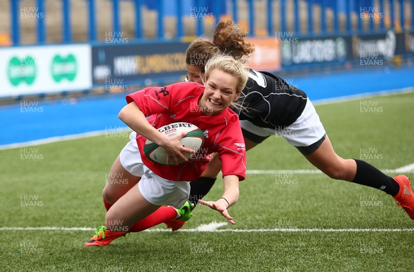 300417 - Under 18s Girls Rugby - East Wales v West Wales - Celyn Lazenby of West Wales scores a try