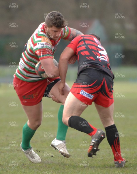 240416 -Ebbw_Vale v Aberavon-Principality_Premiership-Ebbw's Adam Jones is tackled by Aberavon's Ieuan Davies