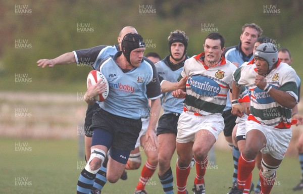 220403 - Ebbw Vale v Cardiff - Welsh Premiership - Matt Allen rounds Kati Tuipolutu