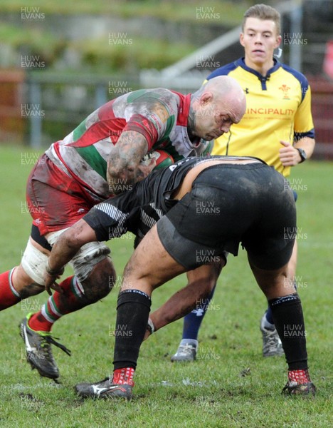 070117 - Ebbw Vale v Cross Keys, Principality Premiership Ebbw Vale captain Damien Hudd is tackled by Cross Keys' Leon Brown by Huw Evans Agency