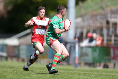 100525 - Ebbw Vale v Llandovery - Super Rygbi Cymru (SRC) Semi Final - Ryan Gardner of Ebbw Vale turns to run at Llien Morgan of Llandovery 