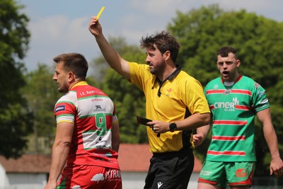100525 - Ebbw Vale v Llandovery - Super Rygbi Cymru (SRC) Semi Final - Referee Ben Whitehouse shows Lee Rees of Llandovery  a yellow card 