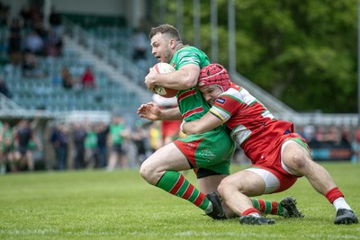 100525 - Ebbw Vale v Llandovery - Super Rygbi Cymru (SRC) Semi Final - Harri Doel of Llandovery cant stop Ethan Phillips of Ebbw Vale heading toward the try line 
