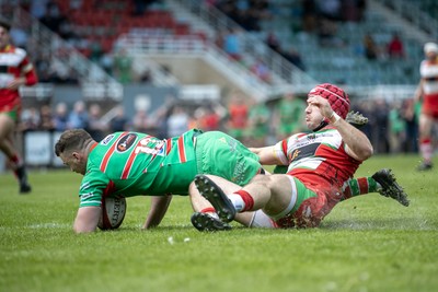 100525 - Ebbw Vale v Llandovery - Super Rygbi Cymru (SRC) Semi Final - Harri Doel of Llandovery cant stop Ethan Phillips of Ebbw Vale heading toward the try line 