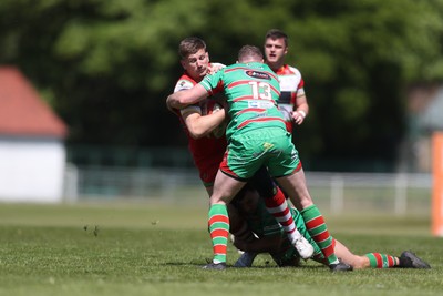 100525 - Ebbw Vale v Llandovery - Super Rygbi Cymru (SRC) Semi Final - Joe Powell of Llandovery is stopped by Ethan Phillips of Ebbw Vale
