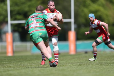 100525 - Ebbw Vale v Llandovery - Super Rygbi Cymru (SRC) Semi Final - Berian Watkins of Llandovery attacks Adam Williams of Ebbw Vale