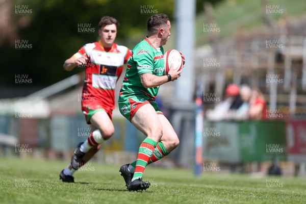 100525 - Ebbw Vale v Llandovery - Super Rygbi Cymru (SRC) Semi Final - Ryan Gardner of Ebbw Vale turns to run at Llien Morgan of Llandovery 