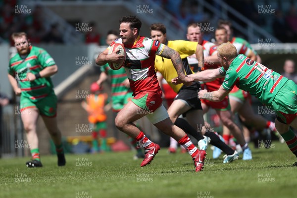 100525 - Ebbw Vale v Llandovery - Super Rygbi Cymru (SRC) Semi Final - Rhodri Jones of Llandovery breaks away from Ieuan Evans of Ebbw Vale to score a try
