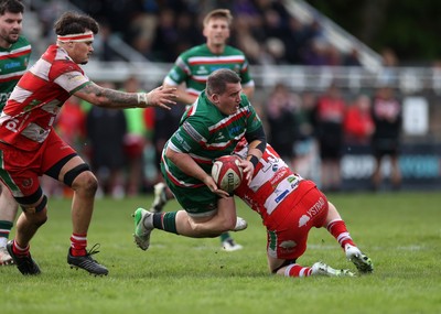 100526 - Ebbw Vale v Llandovery RFC - Super Rygbi Cymru Grand Final - Morgan Bosanko of Ebbw Vale is tackled by Kian Abraham of Llandovery 