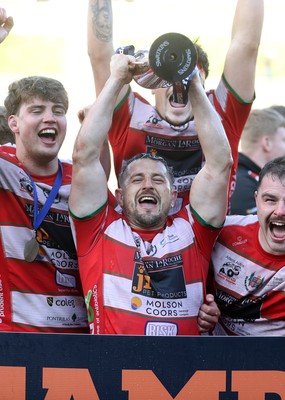 100526 - Ebbw Vale v Llandovery RFC - Super Rygbi Cymru Grand Final - Lee Rees of Llandovery lifts the trophy