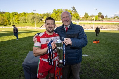 100526 - Ebbw Vale v Llandovery RFC - Super Rygbi Cymru Grand Final - Lee Rees of Llandovery is presented the trophy by WRU president Terry Cobner