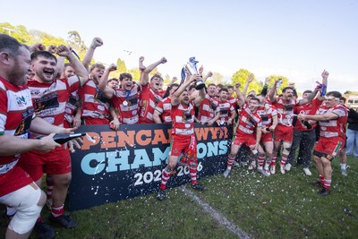 100526 - Ebbw Vale v Llandovery RFC - Super Rygbi Cymru Grand Final - Lee Rees of Llandovery lifts the trophy alongside his team mates