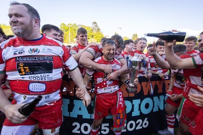 100526 - Ebbw Vale v Llandovery RFC - Super Rygbi Cymru Grand Final - Lee Rees of Llandovery lifts the trophy alongside his team mates