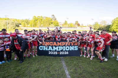 100526 - Ebbw Vale v Llandovery RFC - Super Rygbi Cymru Grand Final - Lee Rees of Llandovery lifts the trophy alongside his team mates