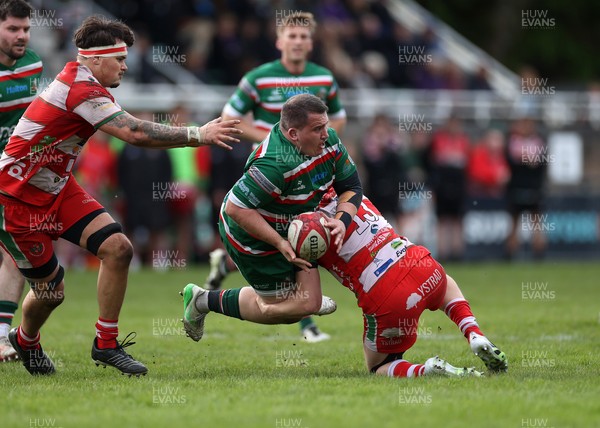 100526 - Ebbw Vale v Llandovery RFC - Super Rygbi Cymru Grand Final - Morgan Bosanko of Ebbw Vale is tackled by Kian Abraham of Llandovery 