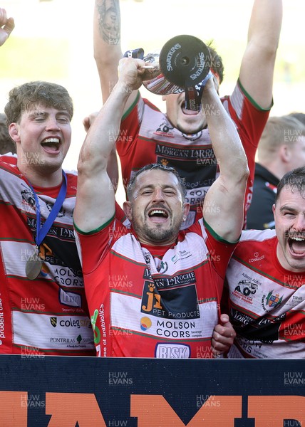 100526 - Ebbw Vale v Llandovery RFC - Super Rygbi Cymru Grand Final - Lee Rees of Llandovery lifts the trophy