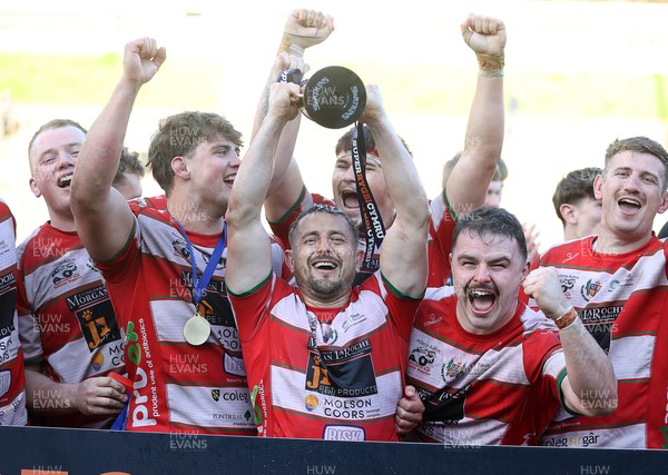 100526 - Ebbw Vale v Llandovery RFC - Super Rygbi Cymru Grand Final - Lee Rees of Llandovery lifts the trophy
