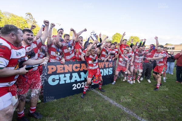 100526 - Ebbw Vale v Llandovery RFC - Super Rygbi Cymru Grand Final - Lee Rees of Llandovery lifts the trophy alongside his team mates