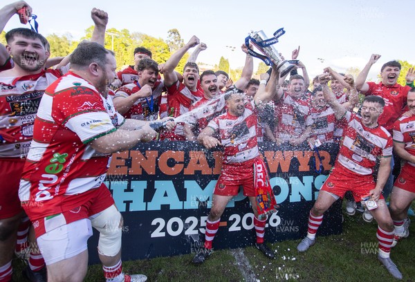 100526 - Ebbw Vale v Llandovery RFC - Super Rygbi Cymru Grand Final - Lee Rees of Llandovery lifts the trophy alongside his team mates