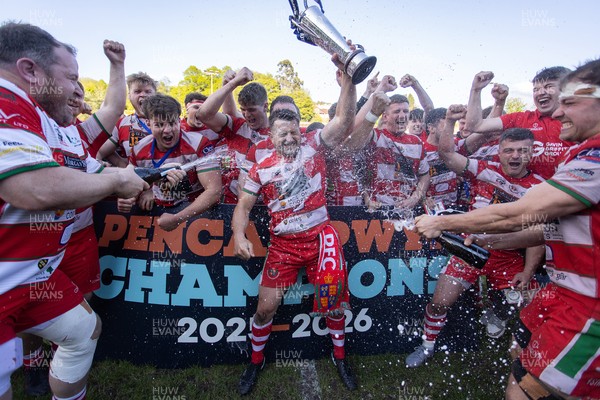 100526 - Ebbw Vale v Llandovery RFC - Super Rygbi Cymru Grand Final - Lee Rees of Llandovery lifts the trophy alongside his team mates