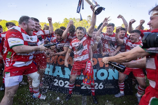 100526 - Ebbw Vale v Llandovery RFC - Super Rygbi Cymru Grand Final - Lee Rees of Llandovery lifts the trophy alongside his team mates
