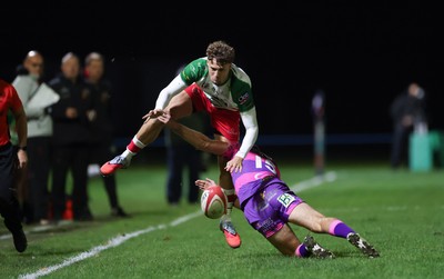 161025 - Ebbw Vale v Llandovery, Super Rugbi Cymru - Tomi Lewis of Llandovery is tackled by Evan Lloyd of Ebbw Vale