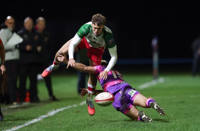 161025 - Ebbw Vale v Llandovery, Super Rugbi Cymru - Tomi Lewis of Llandovery is tackled by Evan Lloyd of Ebbw Vale