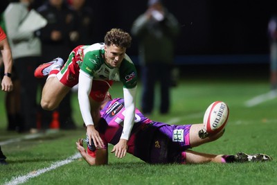 161025 - Ebbw Vale v Llandovery, Super Rugbi Cymru - Tomi Lewis of Llandovery is tackled by Evan Lloyd of Ebbw Vale