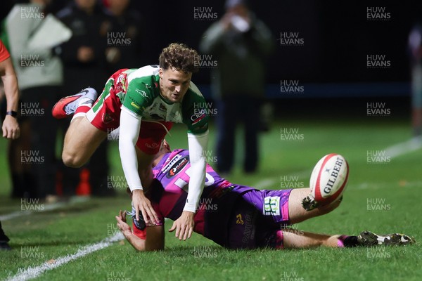 161025 - Ebbw Vale v Llandovery, Super Rugbi Cymru - Tomi Lewis of Llandovery is tackled by Evan Lloyd of Ebbw Vale
