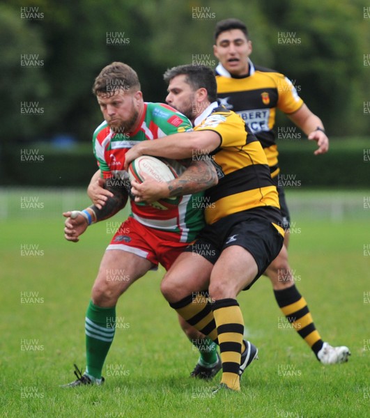 160917 - Ebbw Vale v Newport - Principality Premiership - Ebbw's Ronny Kynes is tackled by Newport's Ryan James