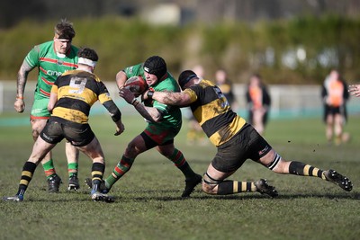 010325 - Ebbw Vale v Newport - Super Rygbi Cymru - Ryan Jenkins of Ebbw Vale is challenged by Josh Skinner of Newport