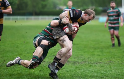 030526 - Ebbw Vale v Newport RFC, Super Rugbi Cymru Play Off Semi-Final - Carwyn Penny of Newport is tackled by Sion Parry of Ebbw Vale