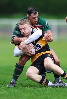 030526 - Ebbw Vale v Newport RFC, Super Rugbi Cymru Play Off Semi-Final - Lucus Welch of Newport is held by Dom Franchi of Ebbw Vale
