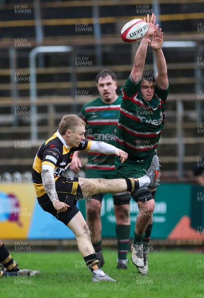 030526 - Ebbw Vale v Newport RFC, Super Rugbi Cymru Play Off Semi-Final - Curtis Gregory of Ebbw Vale looks to charge down a kick from Lucus Welch of Newport