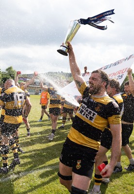 180525 - Ebbw Vale  v Newport RFC, Super Rygbi Cymru Grand Final - Newport captain Ben Roach lifts the Super Rygbi Cymru trophy after the victory over Ebbw Vale