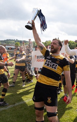 180525 - Ebbw Vale  v Newport RFC, Super Rygbi Cymru Grand Final - Newport captain Ben Roach lifts the Super Rygbi Cymru trophy after the victory over Ebbw Vale