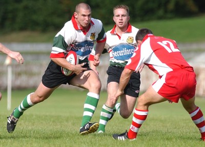 060903 - Ebbw Vale v Pontypridd - Welsh Premiership - Ebbw Vale's Tim Bagg (L) runs at Jason Lewis