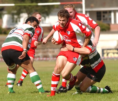 060903 - Ebbw Vale v Pontypridd - Welsh Premiership - Ponty's Kristian Owen is tackled by Tim Bagg