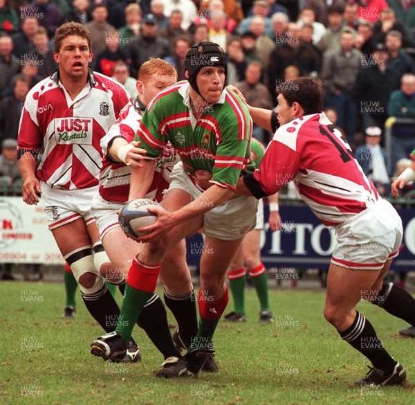 190497 - Ebbw Vale v Pontypridd - Paul Pook is tackled by Jason Lewis and Martyn Williams