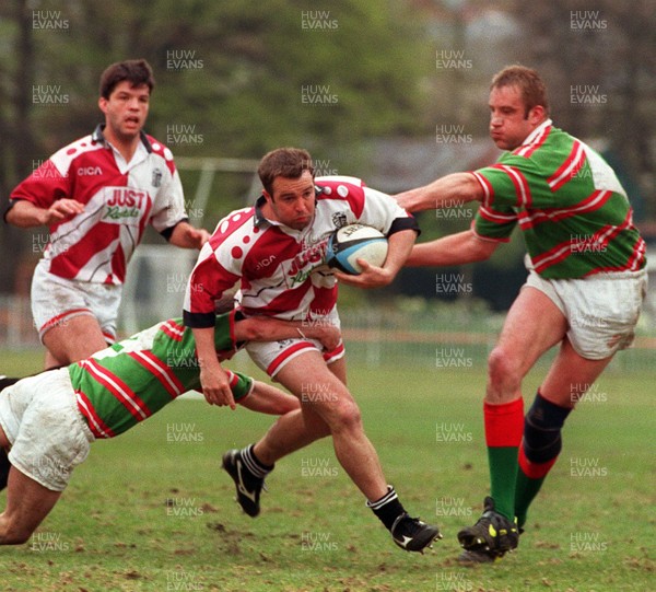 190497 - Ebbw Vale v Pontypridd - David Manley is tackled by Mike Boys and Jason Lillas