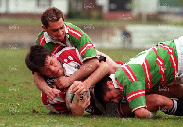 190497 - Ebbw Vale v Pontypridd - Crispin Cormack is tackled by Mike Boys and Alan Harries