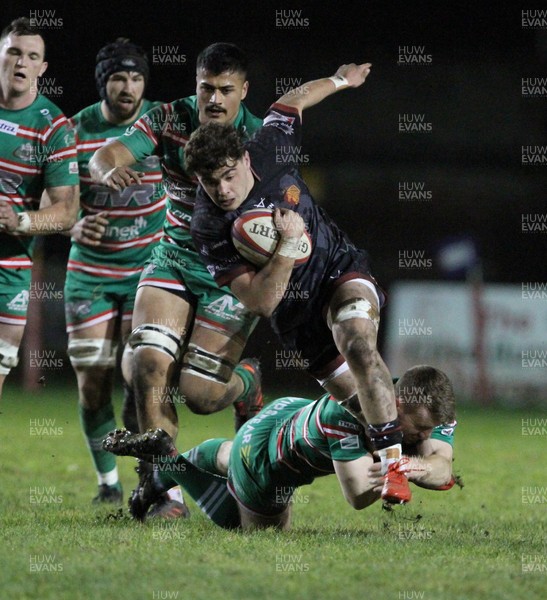 191121 - Ebbw Vale v RGC - Indigo Group Premiership Cup - Ethan Fackrell of RGC is tackled by Jon Evans of Ebbw Vale