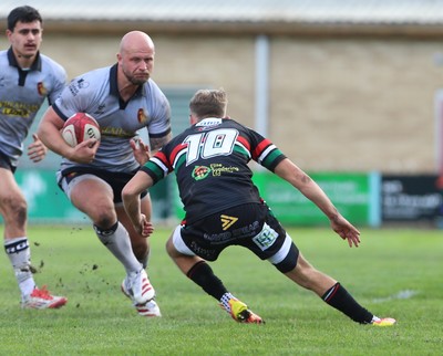 260926 - Ebbw Vale v RGC - Super Rygbi Cymru (SRC) - Delwyn Jones of RGC is tackled by Harry Ford of Ebbw Vale