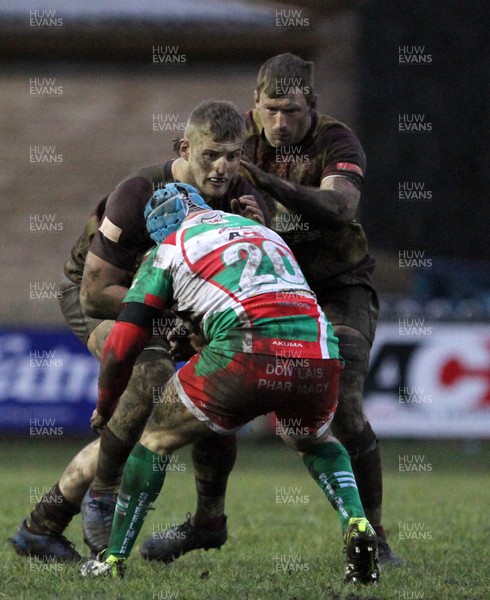 060118 - Ebbw Vale v RGC1404 - WRU National Cup -  Robin Williams of RGC1404 is tackled by Joseph Franchi of Ebbw Vale