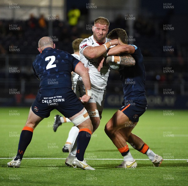 170922 - Edinburgh Rugby v Dragons RFC - United Rugby Championship - Ross Moriarty of Dragons RFC is tackled by Dave Cherry of Edinburgh (L)
