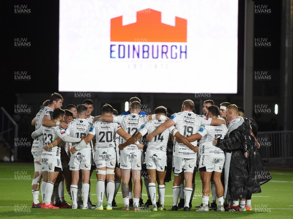 170922 - Edinburgh Rugby v Dragons RFC - United Rugby Championship - Dragons players gather into a huddle at the end of the match following a 44-6 defeat