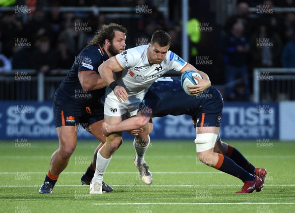 150423 - Edinburgh Rugby v Ospreys - United Rugby Championship - Michael Collins of Ospreys is tackled by Pierre Schoeman