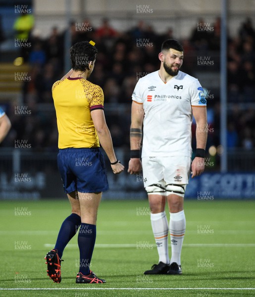 150423 - Edinburgh Rugby v Ospreys - United Rugby Championship - Rhys Davies of Ospreys is given a yellow card by referee Gianluca Gnecchi in the first half